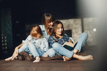 Mother with daughters at home