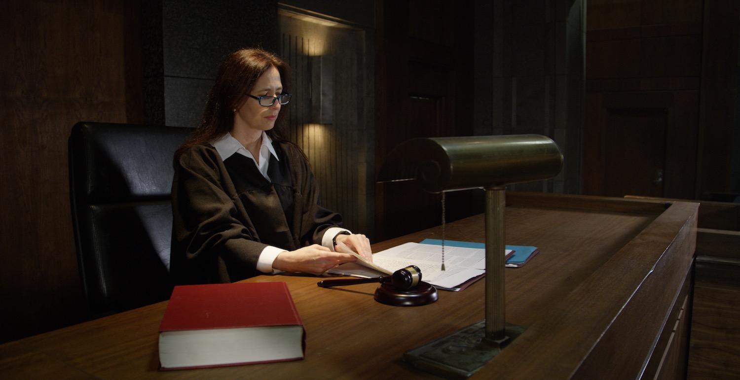 Female judge on the bench in a courtroom