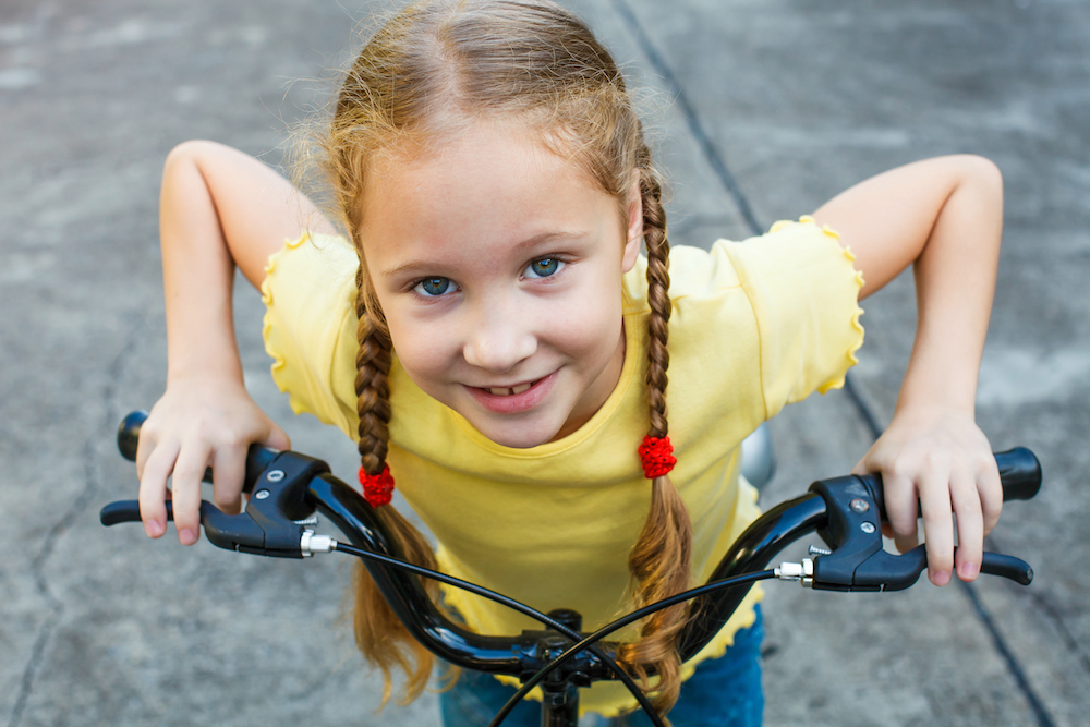 happy child on a bicycle