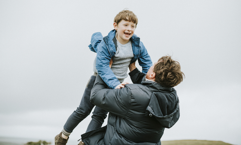 Happy father and son enjoying together